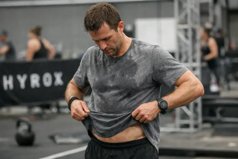 Clothing friction and heat buildup affecting comfort during a HYROX race