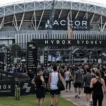 Crowd of athletes arriving at HYROX Sydney at Accor Stadium — the full HYROX cost in Australia goes well beyond the entry fee