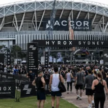 Crowd of athletes arriving at HYROX Sydney at Accor Stadium — the full HYROX cost in Australia goes well beyond the entry fee