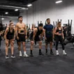 How to choose your HYROX division — athletes lined up at the start of a HYROX race
