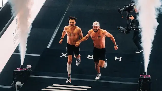 Alexander Roncevic crossing the HYROX finish line in a world championship race