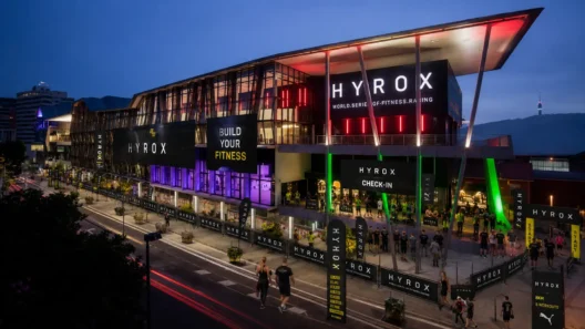 Brisbane Convention & Exhibition Centre lit up at dusk during HYROX Brisbane check-in