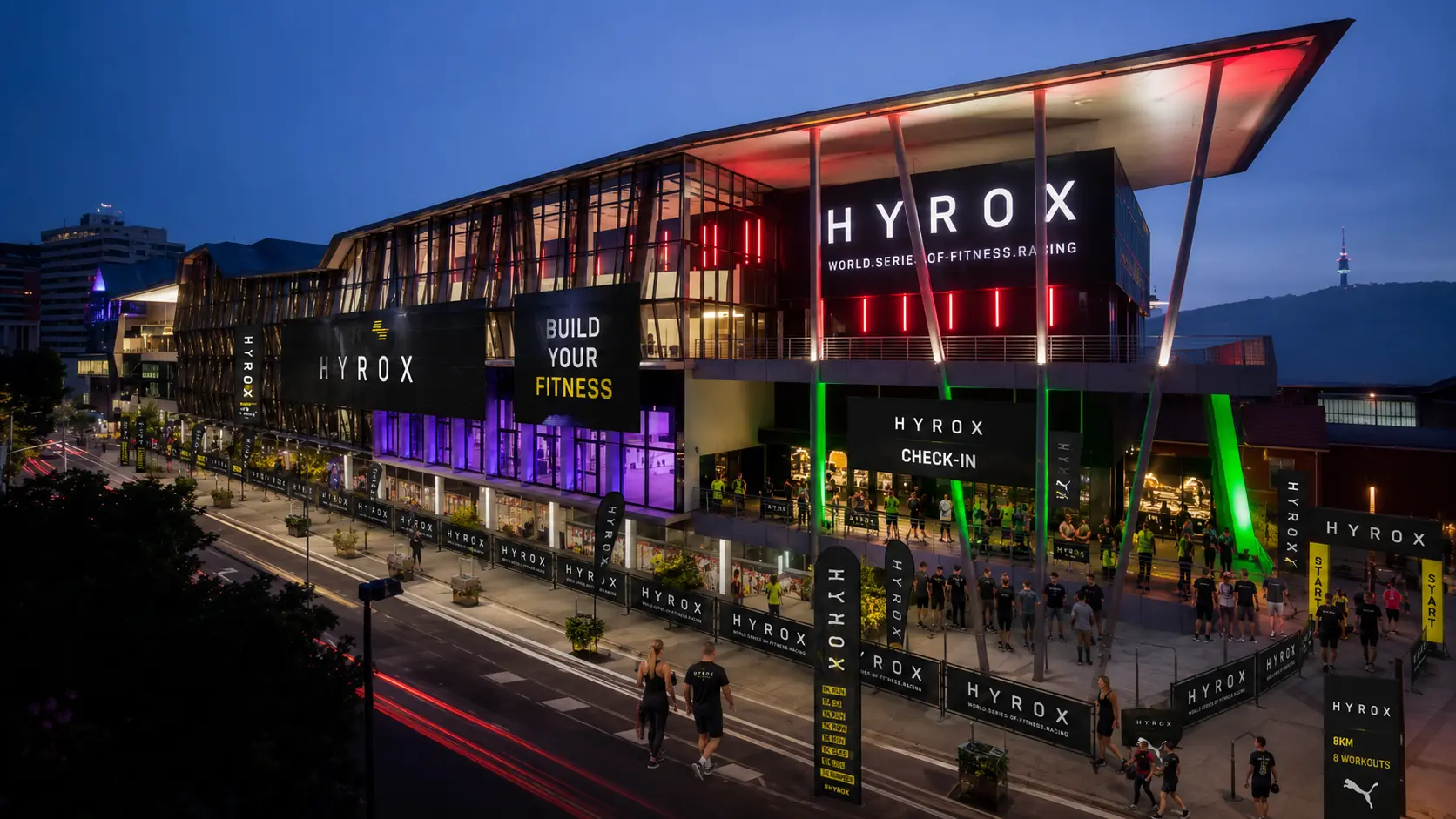 Brisbane Convention & Exhibition Centre lit up at dusk during HYROX Brisbane check-in
