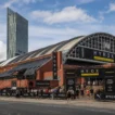Manchester Central Convention Complex entrance during HYROX Manchester, with the Beetham Tower in the background