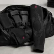 HYROX gear bag with compression knee sleeve, socks and grip gloves, part of a best HYROX equipment 2026 kit