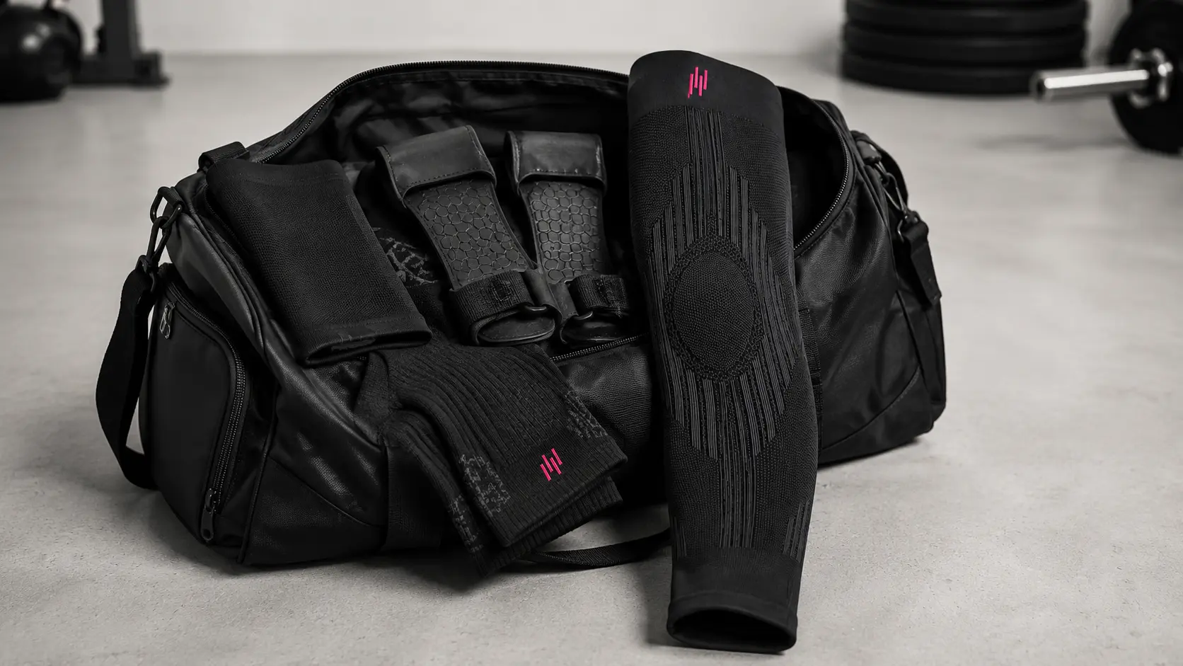 HYROX gear bag with compression knee sleeve, socks and grip gloves, part of a best HYROX equipment 2026 kit