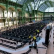 Aerial view of the HYROX race floor inside the Grand Palais, showing the venue's iconic glass and iron roof