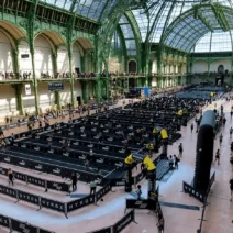 Aerial view of the HYROX race floor inside the Grand Palais, showing the venue's iconic glass and iron roof