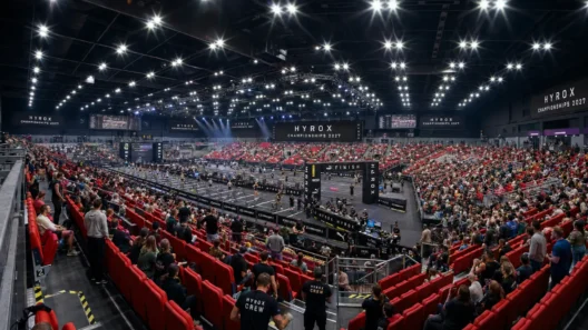 Packed arena crowd watching the HYROX World Championships 2027 finish line