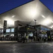 Entrance to the exhibition venue hosting HYROX Bari 2027 at dusk