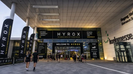 HYROX Cologne 2027 entrance at Koelnmesse, home to FIBO Caption : Athletes arriving at the HYROX entrance inside Koelnmesse — the venue for HYROX Cologne 2027.