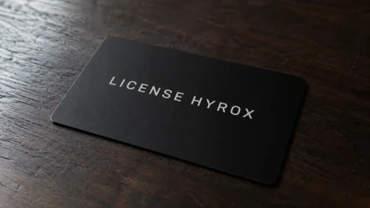 HYROX athlete license card resting on a wooden table